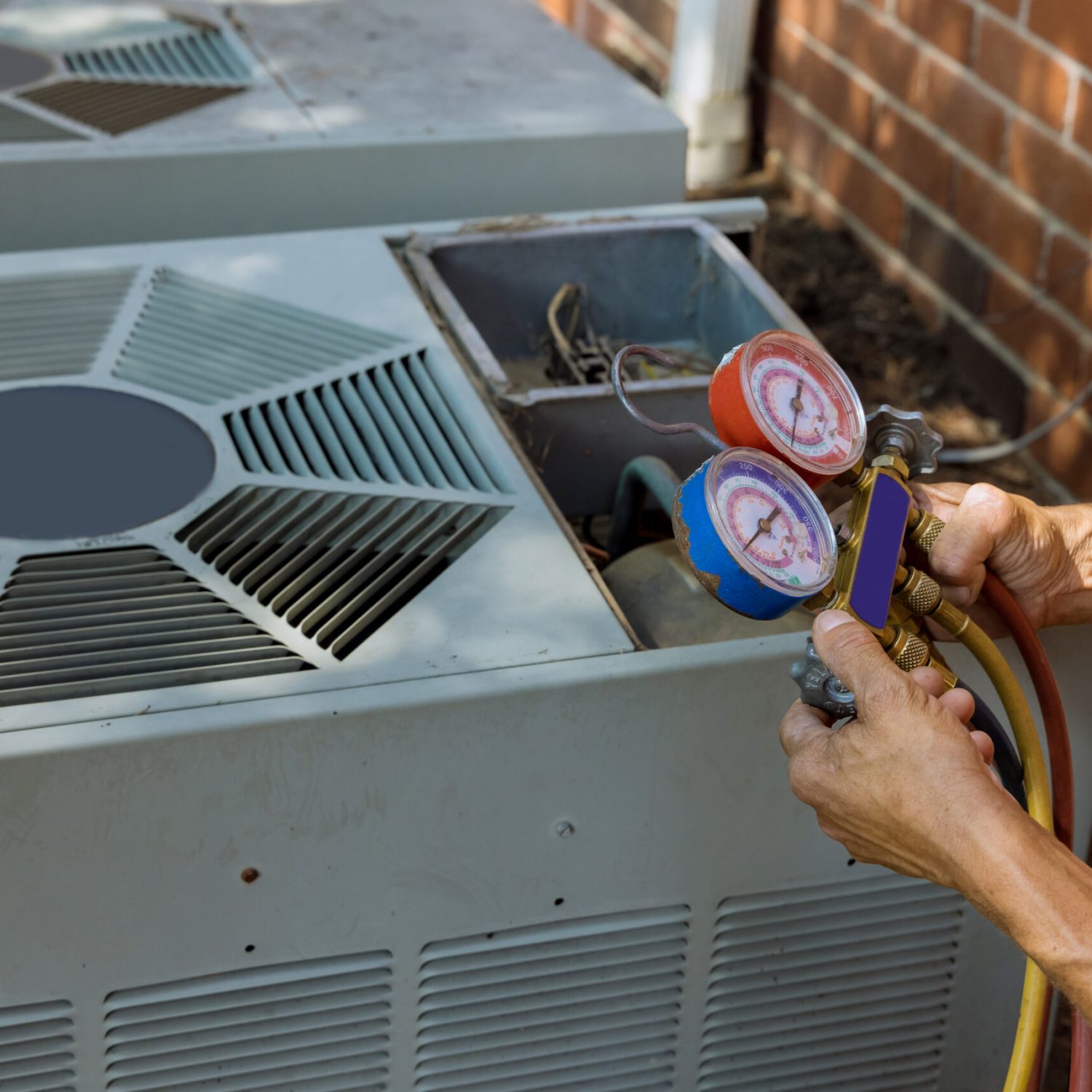 Air conditioning technician servicing of preparing to air conditioner